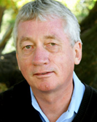 Dr. de Waal outside beneath a tree