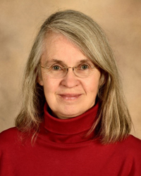 studio headshot of Dr. Duncan