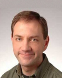 studio headshot of Dr. Ramsay