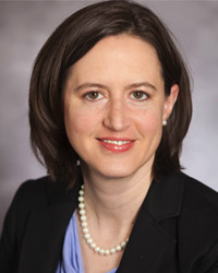 studio headshot of Dr. Raper