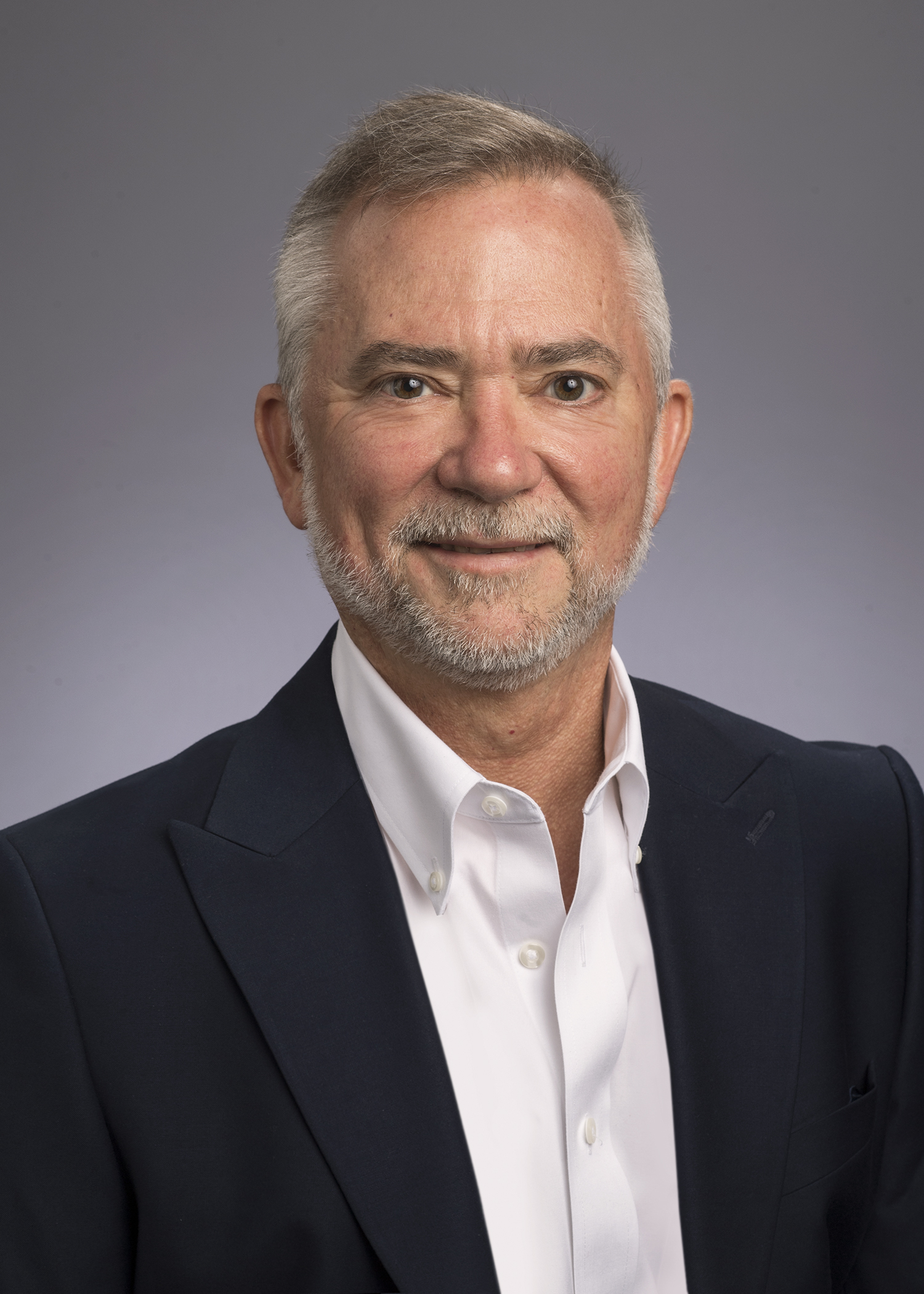Studio headshot of Dr Young